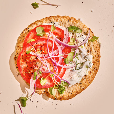 Loaded Open-Faced 'Bagel' with Scallion Cream Cheese, Tomatoes & Red Onions